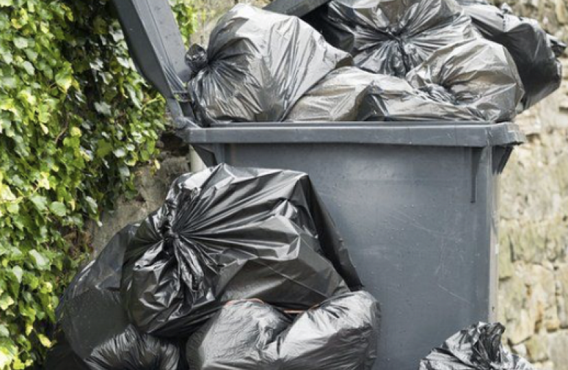 Bath recycling bin overflowing